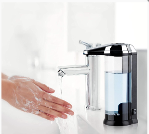 washing hands using automatic soap dispenser